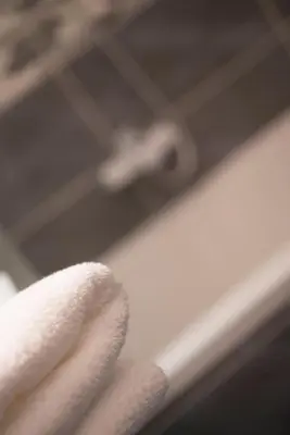 a close up of a hand holding a towel at Free.three in Belgrade