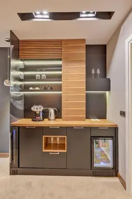a kitchen with a wooden counter top in a room at Black Pearl Luxury Suites in Belgrade