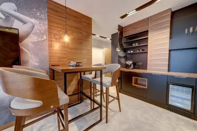 a dining room with a table and chairs at Black Pearl Luxury Suites in Belgrade