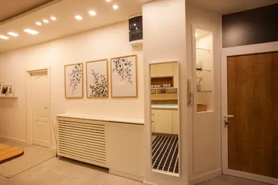 a kitchen with white walls and a counter and a door at BestStay Apartment No 9 Pedestrian zone in Belgrade