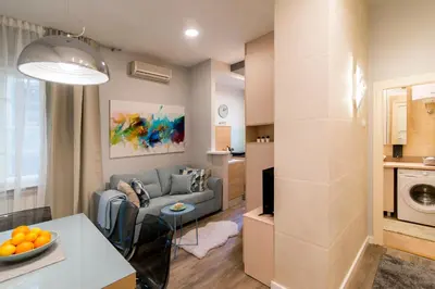 a living room with a couch and a table at Top Central 5 Apartments in Belgrade