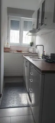 a kitchen with a sink and a counter top at Jumi in Belgrade