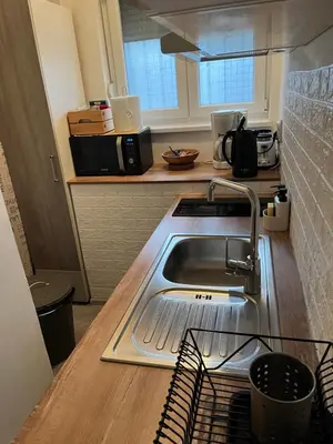 a kitchen with a sink and a counter top at Jumi in Belgrade