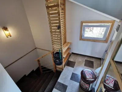 an overhead view of a room with a spiral staircase at Gardos riverview in Belgrade