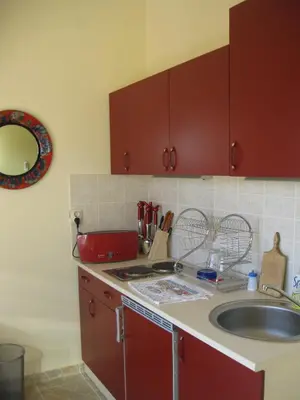a kitchen with a sink and a counter top at Hostel Oasis in Belgrade