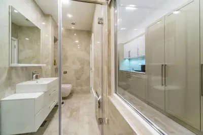 a bathroom with a shower and a sink and a toilet at Royal Knez in Belgrade