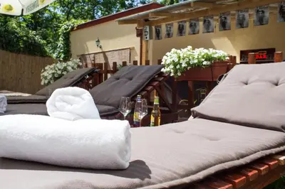 a bunch of towels sitting on top of a table at Villa Mystique in Belgrade