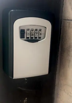 a close up of a black and white microwave door at Apartment on a river avenue in Pančevo