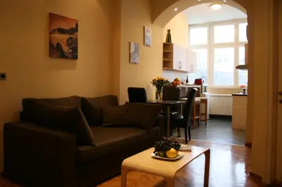 a living room with a couch and a table at Belgrade Stay Apartments in Belgrade