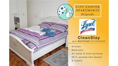 a poster of a bed in a room at City Center Belgrade Queen Apartment Skadarlija in Belgrade