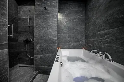 a bathroom with a bath tub filled with snow at Sinergija in Belgrade