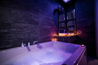 a bathroom with a tub filled with snow at Sinergija in Belgrade