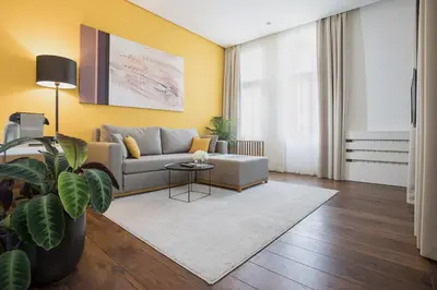 a living room with a couch and a table at Dominic Smart & Luxury Suites - Terazije in Belgrade