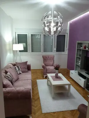 a living room with a couch and a coffee table at Apartment Centar Exclusive Smederevo in Smederevo
