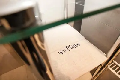 a napkin with the words riparma written on it at Piano Cube in Belgrade