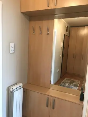 a kitchen with a large mirror in a room at Apartman AS in Belgrade