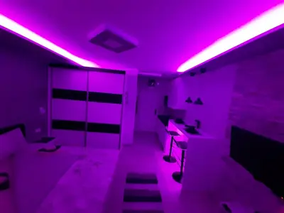 a room with purple lights on the ceiling at Victoria in Vračar (historical)