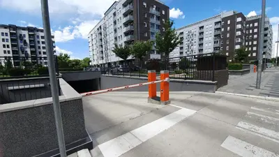 an empty street with orange barriers in a city at Loko Savada in Belgrade