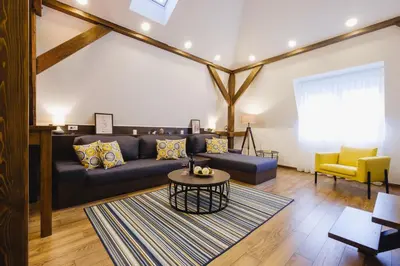 a living room with a couch and a table at Apartment Lea Lux-5 min to Danube, Quite & Cozy, Easy parking nearby in Belgrade