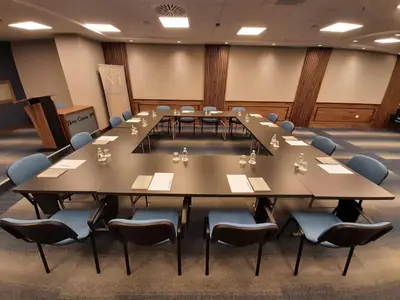 a large conference room with a large table and chairs at Hotel Centar No.1 in Belgrade
