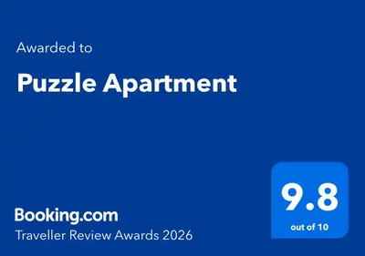 a blue sign with the words payable appointment on it at Puzzle Apartment in Dedinje