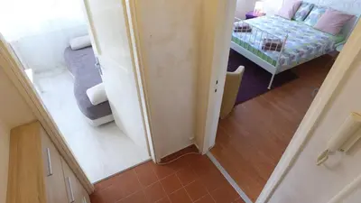 an overhead view of a small room with a bedroom at GRACE in Tošin Bunar