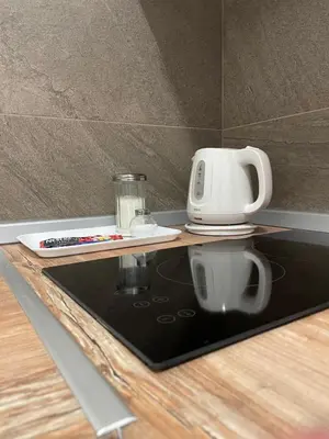 a coffee maker sitting on top of a table at Apartment Dada Center of Belgrade in Belgrade