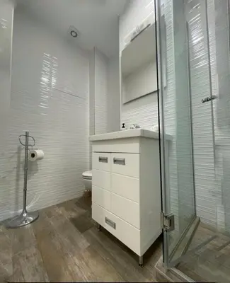 a bathroom with a shower and a sink and a toilet at Apartment Dada Center of Belgrade in Belgrade