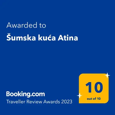 a yellow sign with the text awarded to suniya kuleta africa at Šumska kuća Atina - Devojački Bunar in Alibunar
