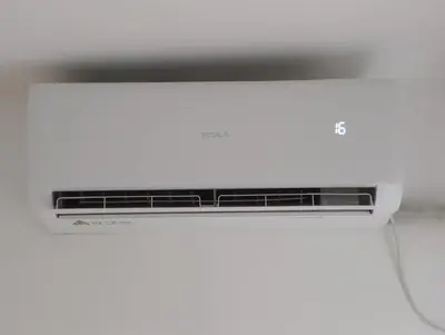 a laptop computer sitting on top of a white desk at Dolce Casa in Belgrade