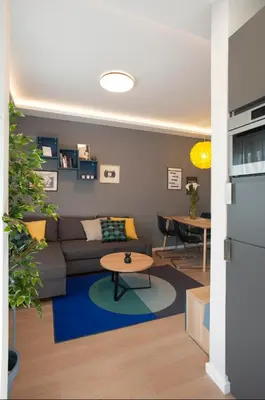 a living room with a couch and a table at Victor Residence in Belgrade