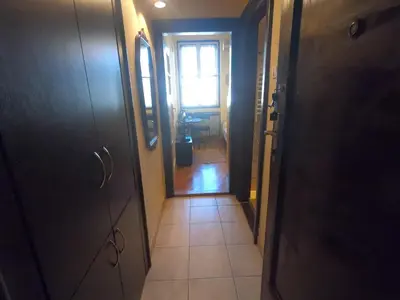 a hallway with a door leading to a room at Aprtman Sonja 2 in Belgrade