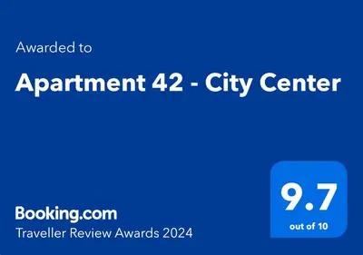 a blue sign that reads appointment city center at Apartment 42 - City Center in Belgrade