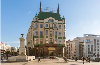 a large building with a tower on top of it at Apartment 42 - City Center in Belgrade