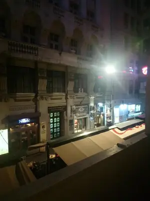 a building with a street light in front of it at Apartment Bubble in Belgrade