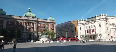 a city square with buildings and people walking around at BUDGET - Authentic Belgrade Centre Apartment #4, 3 Bedrooms, 1 full Bathroom, 1 Toilet in Belgrade