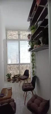 a living room with two chairs and a table at BUDGET - Authentic Belgrade Centre Apartment #4, 3 Bedrooms, 1 full Bathroom, 1 Toilet in Belgrade