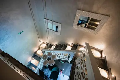 an overhead view of a living room with a mirror at FLOW in Belgrade