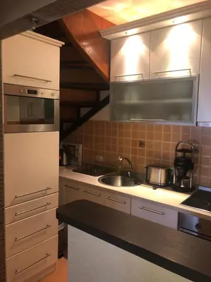 a kitchen with a sink and a counter top at Danube duplex apartment in Smederevo
