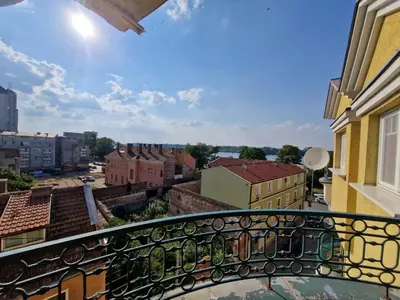 a balcony with a view of a city at Danube duplex apartment in Smederevo