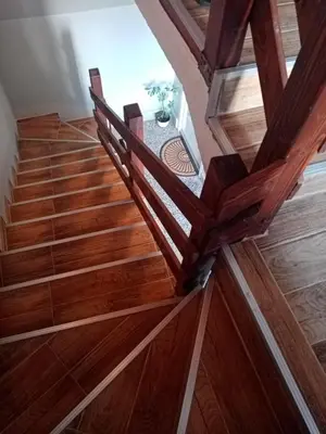 an overhead view of a wooden staircase with wood flooring at Apartment Viktor in Belgrade