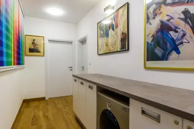 a laundry room with a washer and dryer at Vracar Apartment in Belgrade
