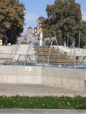 a fountain with fountains in front of a building at Studio Krunska 6 in Belgrade