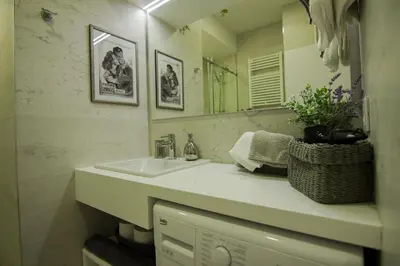 a bathroom with a sink and a mirror at Studio Stil in Belgrade