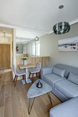 a living room with a couch and a table at Belly2 in Vračar (historical)