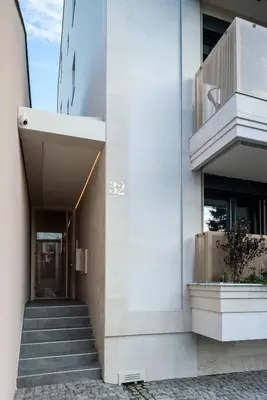 a facade of a building with stairs in front at Belly2 in Vračar (historical)
