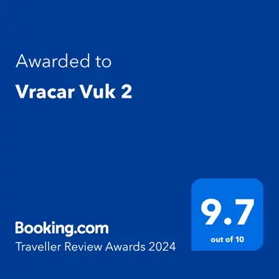 a blue text box with the words awarded to vaza vulk at Vracar Vuk 2 in Belgrade