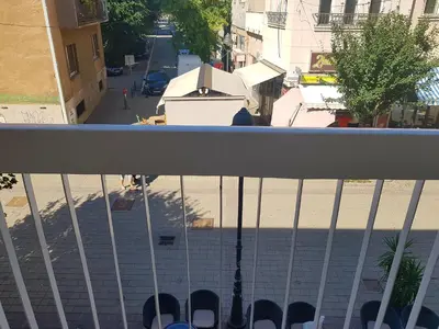 a view of a street from a balcony at Apartman Harmony in Smederevo