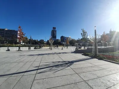 a large plaza with trees in a city at Belgrade Center Apartment Slavija Square III in Belgrade