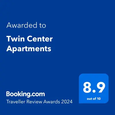 a blue screen with the text awarded to twin center apartments at Twin Center Apartments in Belgrade